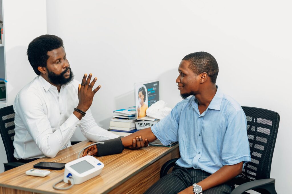 pexels-ninthgrid-2149521550-30677591-LR Doctor Consultation with Blood Pressure Checkup in Lagos, Nigeria. Credit: Ninthgrid